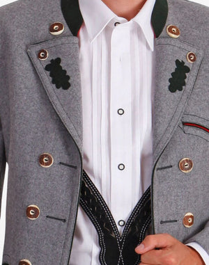 Close-up detail of Alpine heritage grey wool jacket highlighting traditional embroidery, horn buttons, lapel accents, and premium craftsmanship in Bavarian Trachten fashion.