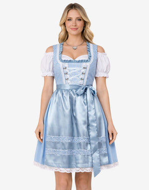 Full front view of model wearing authentic Oktoberfest dirndl showing satin apron lace hem and traditional fit style