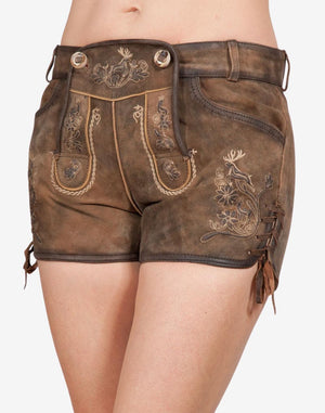Brown traditional Bavarian women’s lederhosen shorts with embroidered floral and deer patterns, front flap detail, and side lace-up design, worn around the waist and thighs