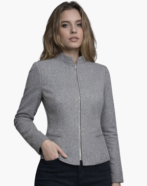 Woman wearing a gray blazer on a white background