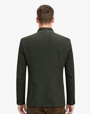 Green blazer worn by a person on a white background