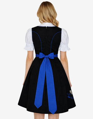 Back view of Bavarian style dirndl for women worn by model showing blue apron bow, fitted bodice and classic shape