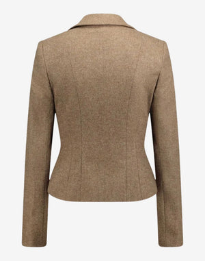 Back view of a women’s beige Bavarian-style trachten jacket with a tailored fit, structured seams, long sleeves, and a classic Alpine heritage design in a wool-blend fabric.