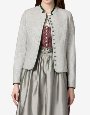 Women’s traditional light grey Bavarian dirndl jacket with green trim, stand collar, and decorative button front, worn over a classic dirndl dress with pleated skirt.