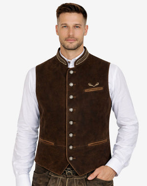 Model wearing classic brown Alpine embroidered vest paired with traditional Bavarian attire, ideal for Oktoberfest and cultural events.