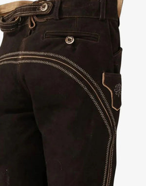 Close-up of dark brown leather pants with stitching details on a white background