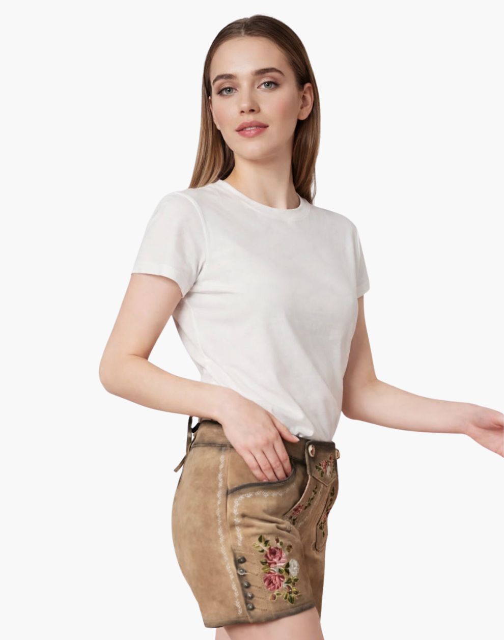 Woman wearing a white t-shirt and brown skirt with floral embroidery on a white background