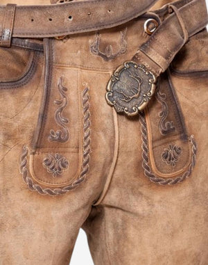 Close front view highlighting embroidered bib flap, belt buckle detail and textured leather finish on festival ready bundhosen for men