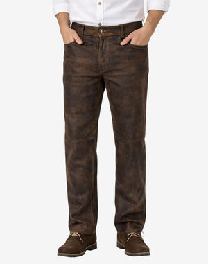 Brown pants worn by a person on a white background
