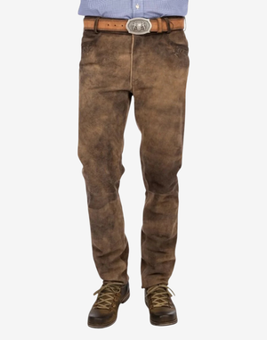 Brown leather pants worn by a person on a white background