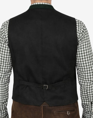 Back view of model wearing German Oktoberfest Vest for Men featuring black rear panel and adjustable buckle strap