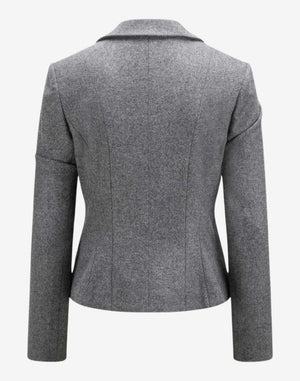 Back view of a women’s grey Alpine-style tailored jacket featuring a structured fit, clean panel stitching, long sleeves, and a classic minimalist design suitable for traditional trachten or dirndl outfits.