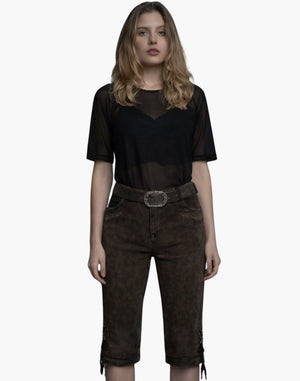 Woman wearing a black sheer top and brown shorts on a white background