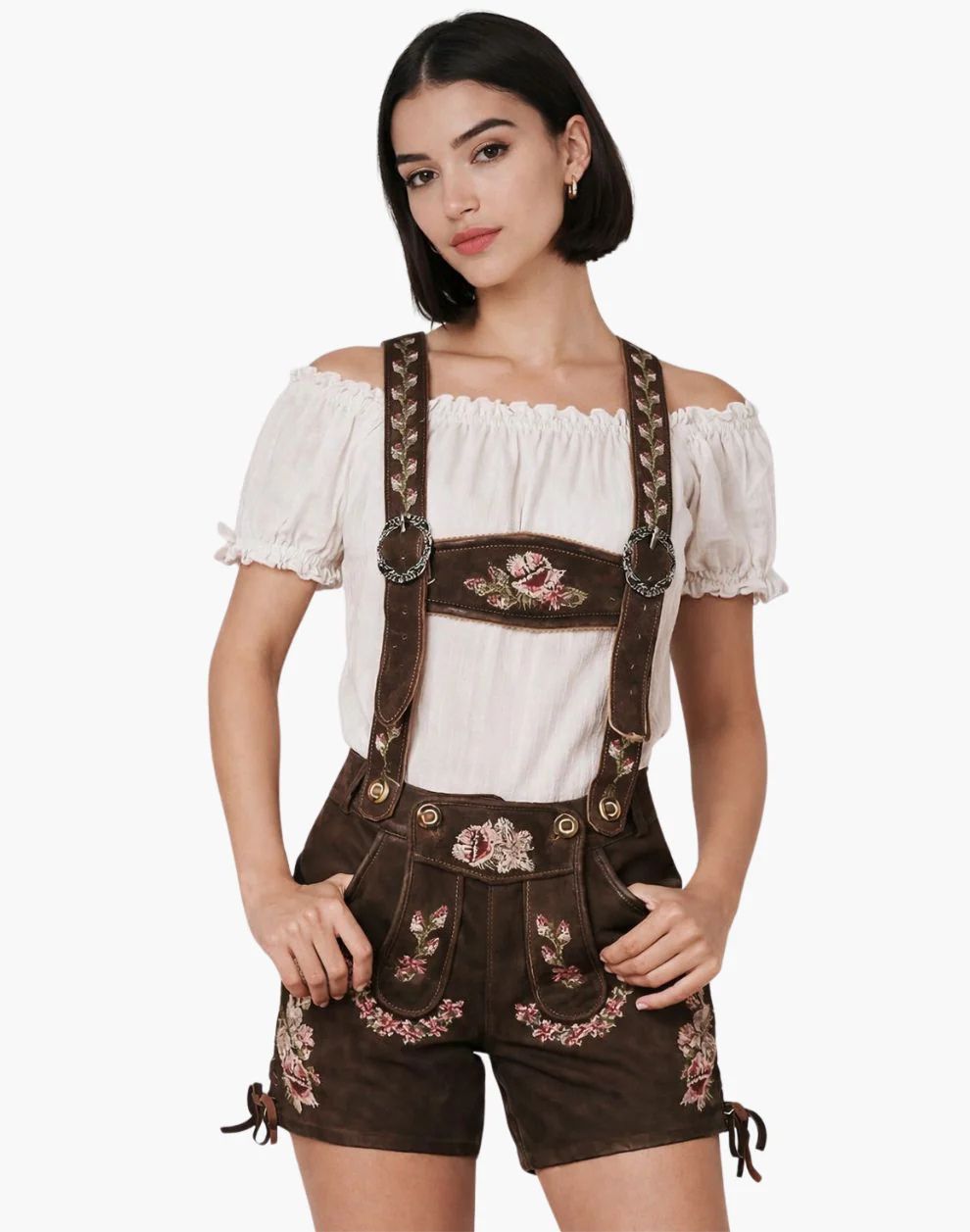 Woman wearing a traditional Bavarian outfit with a white blouse and brown shorts with suspenders on a white background