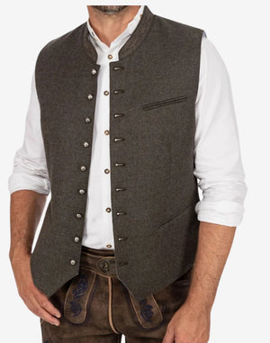 Model wearing classic Bavarian vest for men highlighting traditional fit, front buttons and authentic Oktoberfest inspired styling