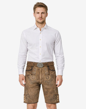 Model wearing mens festival lederhosen outfit with traditional Bavarian leather shorts and decorative Oktoberfest belt