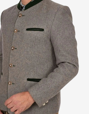 Side profile of mens timeless Bavarian jacket highlighting wool texture, tailored structure and traditional alpine styling.