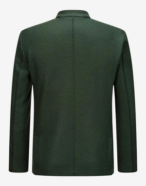 Rear view of mens traditional alpine jacket showing structured back panel, tailored fit and smooth green fabric in authentic Bavarian style