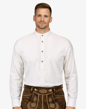 Man wearing a white shirt and brown traditional pants on a white background