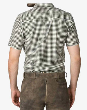 Person wearing a green and white checkered shirt and brown pants on a white background