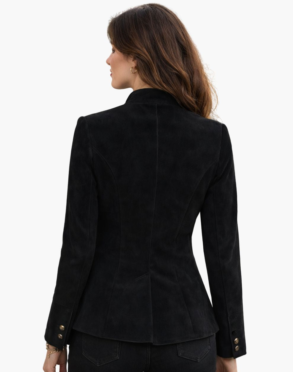 Back view of a woman wearing a black Trachten jacket with a fitted silhouette and traditional Bavarian tailoring, paired with dark bottoms, against a white background.