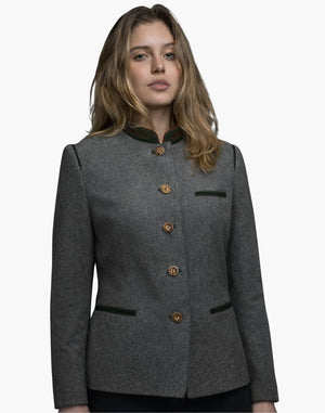 Front view of a woman wearing a charcoal gray tailored jacket with a stand-up collar trimmed in dark green. A vertical row of small metallic buttons runs down the front, and the fitted silhouette is styled with dark jeans. The background is plain light gray.