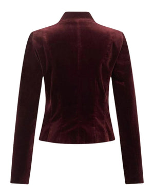 Back view of a burgundy velvet women’s jacket with a structured fit and clean tailored design.