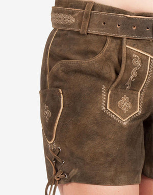 Side view close-up of women’s brown suede lederhosen shorts featuring traditional Bavarian embroidery, decorative pocket detail, braided belt, and lace-up side fastening.