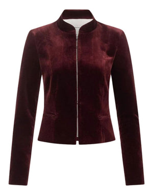 front view of a burgundy velvet women’s jacket with a high collar, front zipper closure, and slim tailored fit.