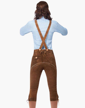 Person wearing a blue checkered shirt and brown leather pants with suspenders on a white background