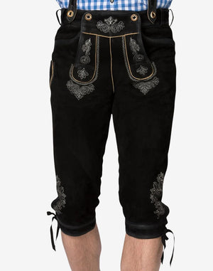 Front model view highlighting the embroidered drop-front flap, floral lower-leg embroidery, and traditional knee-length fit.