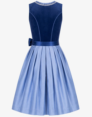 A sleeveless two-tone dress with a dark navy blue velvet bodice and a light blue pleated skirt, featuring a matching satin waistband and bow, set against a plain light gray background.