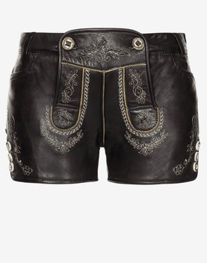 Front view of black women’s authentic German leather lederhosen shorts featuring traditional embroidered patterns, decorative front flap, and side button details.