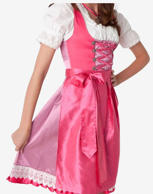 Angled view of womens Bavarian dirndl dress showing satin pink apron, lace trim hem and traditional corset bodice styling