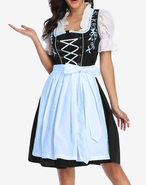 Rear angled view of womens dirndl dress showing fitted waist, pleated skirt structure and classic Bavarian silhouette design