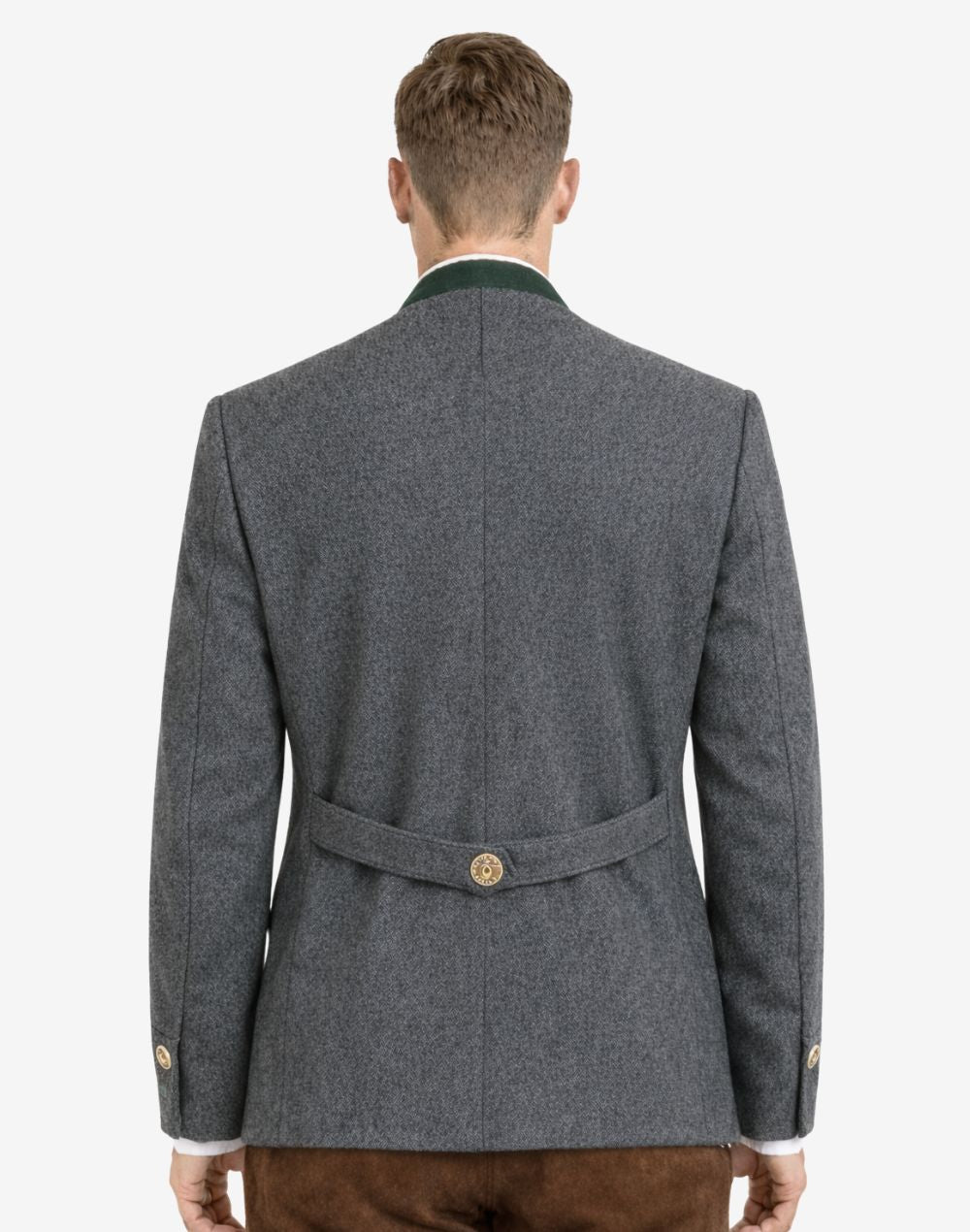 Back view of alpine dark gray wool men’s Trachten jacket on model, featuring traditional Bavarian tailoring, structured fit, and decorative back belt detail.