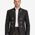 Front view of Alpine heritage charcoal wool jacket for men featuring traditional Bavarian Trachten design, green collar accents, decorative metal buttons, tailored fit, and classic Oktoberfest outfit paired with lederhosen.