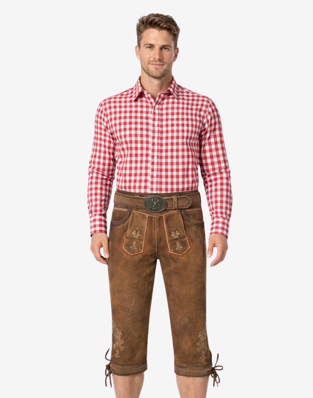 Front view of model wearing Alpine style Bundhosen for men in brown leather with Bavarian embroidery and traditional knee tie details