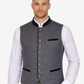 Male model wearing Alpine style wool vest for men paired with traditional Bavarian attire, ideal for Oktoberfest and cultural occasions.