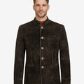 Model wearing antique brown leather Alpine jacket with traditional Bavarian style, stand collar, button front, and authentic Oktoberfest look.