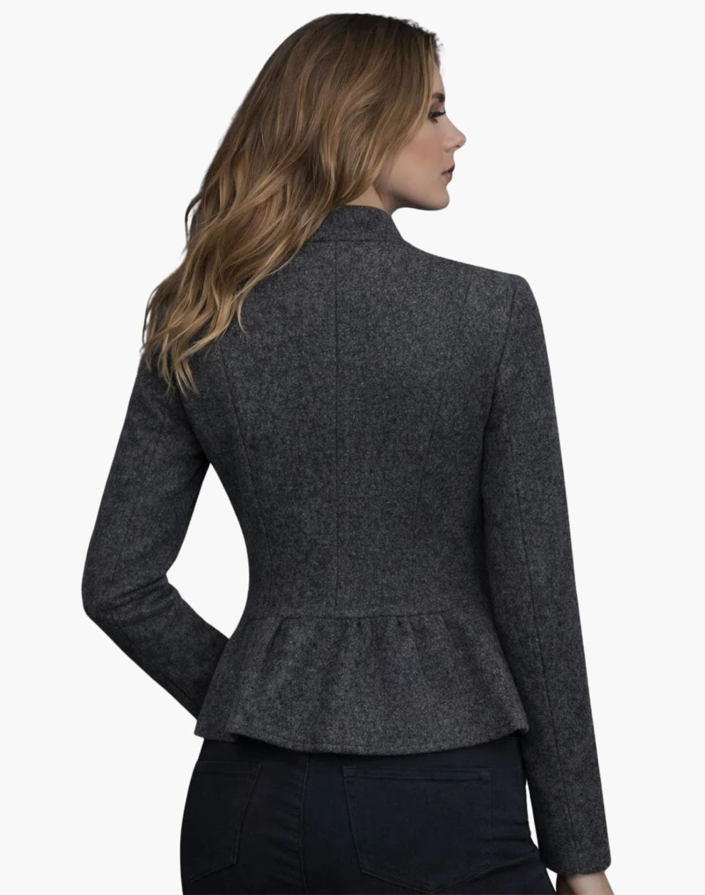 Woman wearing a gray peplum jacket on a white background