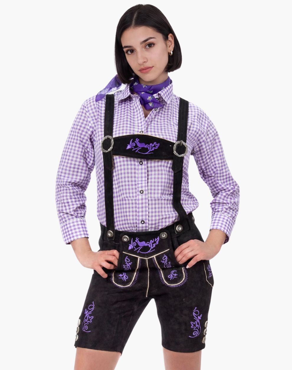 Person wearing a traditional Bavarian outfit with a purple checkered shirt, black lederhosen, and suspenders on a white background.
