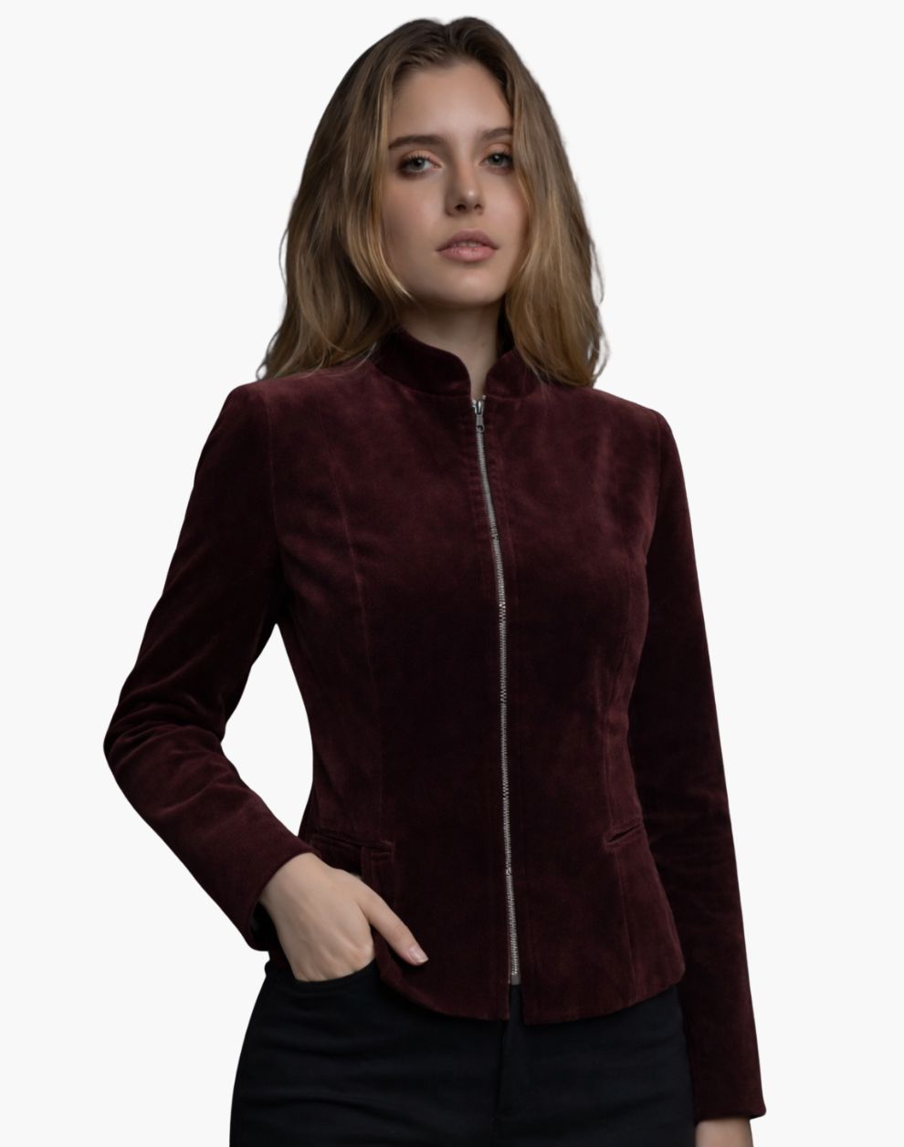 Female model wearing a burgundy velvet jacket with a high collar and front zipper, featuring a fitted tailored silhouette.