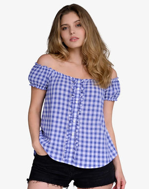 Woman wearing a blue and white checkered off-shoulder top on a white background