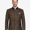 Front view of model wearing Authentic Mens Leather Trachten Jacket in vintage brown with stand collar and horn buttons