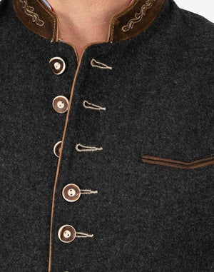 Close up of authentic Oktoberfest vest showing embroidered collar, horn buttons and textured wool fabric.