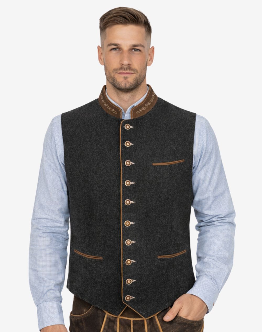 Model wearing authentic Oktoberfest vest for men with dark wool fabric and traditional Bavarian festival styling.