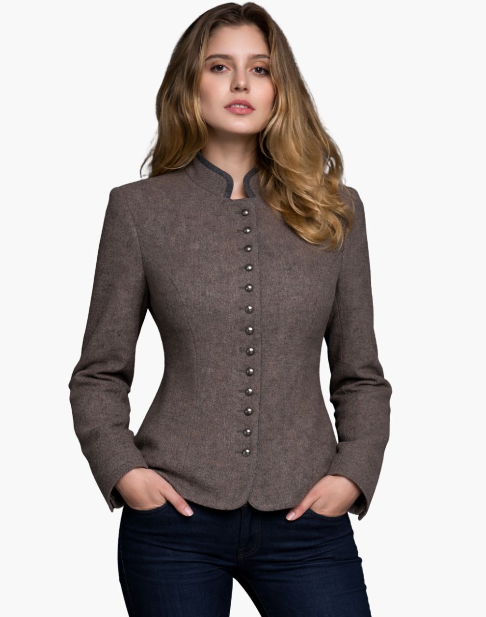Woman wearing an authentic Bavarian Trachten jacket in brown with decorative buttons, a high collar, and a fitted traditional design, paired with dark jeans, against a white background.