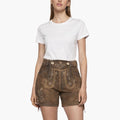 Woman wearing a white t-shirt and brown shorts with decorative stitching on a white background