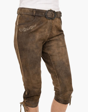 Brown leather Bundhosen with decorative belt and lace-up details on a white background